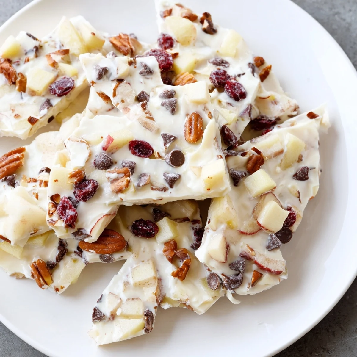 Creamy Apple Cinnamon Yogurt Bark topped with crisp apples, ready for a refreshing bite.