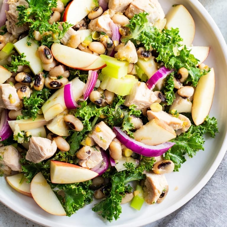 Top view of the delicious Chicken and Apple New Years Luck Salad with toasted pecans, perfect for a festive meal.